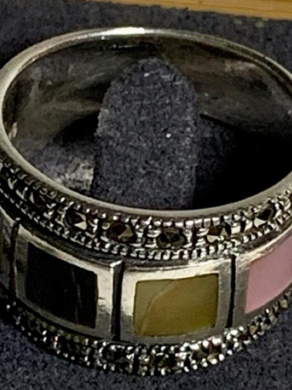 Wide-band sterling silver ring in Art Deco style featuring four rectangular inla